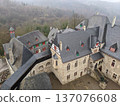 Castle shrouded in mist 137076608