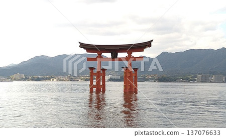 The great torii gate of Itsukushima Shrine stands tall above the sea The great torii gate of Itsukushima Shrine stands tall above the sea 137076633