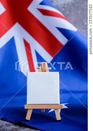 Mock-up for custom copy designs. Clean empty message board next to Australian flag. Place your logo or text on the white paper board next to the Australian flag. Modern mock-up template with national Mock-up for custom copy designs. Clean empty message board next to Australian flag. Place your logo or text on the white paper board next to the Australian flag. Modern mock-up template with national 137077583