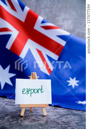 Australian flag and text EXPORT for trade or logistics themes. National identity and export text. Concept of global trade and national manufacturing perfect for commerce 137077584
