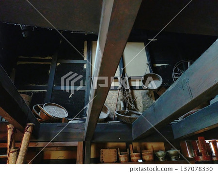 Retro townscape: Ceiling beams and old tools at the Murozu Folk Museum in Mitsumachi, Tatsuno City, Hyogo Prefecture, and Wakihonjin, a former wealthy fishmonger's building. Retro townscape: Ceiling beams and old tools at the Murozu Folk Museum in Mitsumachi, Tatsuno City, Hyogo Prefecture, and Wakihonjin, a former wealthy fishmonger's building. 137078330