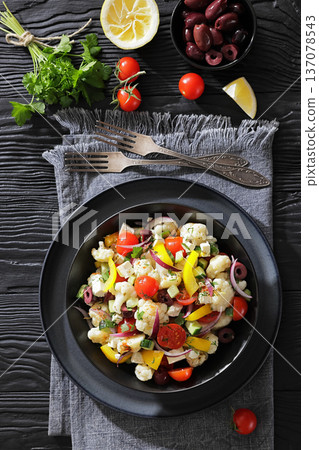 Greek cauliflower salad with feta cheese top view Greek cauliflower salad with feta cheese top view 137078543