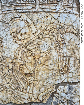 A heroic epic in stone. a warrior and his faithful horse a frozen fragment of the past on the columns of Old Nessebar A heroic epic in stone. a warrior and his faithful horse a frozen fragment of the past on the columns of Old Nessebar 137078654