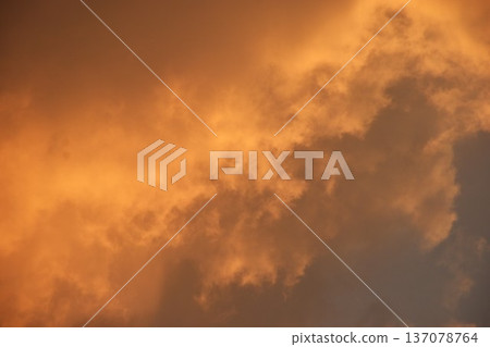 white and orange cloud spreading on twilight sunset blue sky in evening white and orange cloud spreading on twilight sunset blue sky in evening 137078764