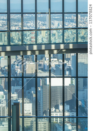 Image of a cityscape seen from the observation deck of a high-rise building Image of a cityscape seen from the observation deck of a high-rise building 137078824