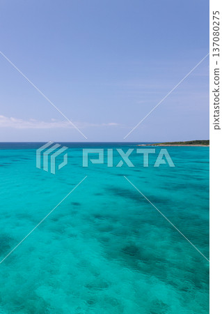 The crystal clear turquoise blue sea that spreads across Ikema Island The crystal clear turquoise blue sea that spreads across Ikema Island 137080275
