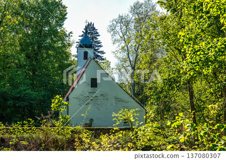 Church St.Clemens in Kranzberg near Freising, Bavaria with ancient graveyard and beautiful old wrought iron crosses 137080307