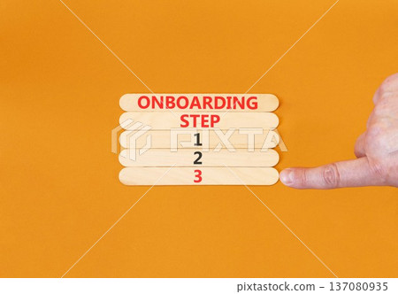 Time to step 3 onboarding symbol. Concept words Onboarding step 3 on beautiful wooden block. Businessman's hand. Beautiful orange background. Business success step 3 onboarding concept. Copy space. 137080935