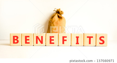 Benefits word symbol. Concept word Benefits on beautiful wooden blocks. Beautiful white background. Beautiful canvas bag. Business support help benefits word concept. Copy space. Benefits word symbol. Concept word Benefits on beautiful wooden blocks. Beautiful white background. Beautiful canvas bag. Business support help benefits word concept. Copy space. 137080971