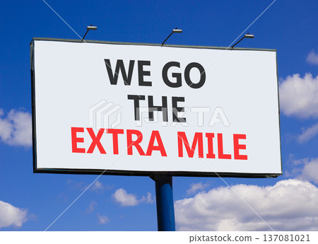 Support, help we go the extra mile symbol. Concept words We go the extra mile on beautiful big white billboard. Beautiful blue sky background. Business we go the extra mile concept. Copy space. Support, help we go the extra mile symbol. Concept words We go the extra mile on beautiful big white billboard. Beautiful blue sky background. Business we go the extra mile concept. Copy space. 137081021