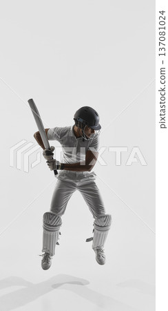 Cricket player mid air preparing to strike on white background wearing helmet and pads. Cricket player mid air preparing to strike on white background wearing helmet and pads. 137081024