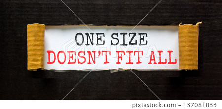 One size does not fit all symbol. Concept words One size does not fit all on beautiful white paper. Beautiful black paper background. Business one size does not fit all concept. Copy space. One size does not fit all symbol. Concept words One size does not fit all on beautiful white paper. Beautiful black paper background. Business one size does not fit all concept. Copy space. 137081033