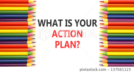 What is your action plan symbol. Concept words What is your action plan on beautiful white paper. Beautiful white background. Colored pencils. Business what is your action plan concept. Copy space. 137081123