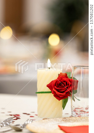 Candle with red rose, Valentine dinner table setting Candle with red rose, Valentine dinner table setting 137081202