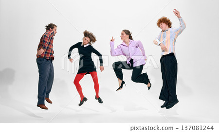 Four people mid air in expressive contemporary fashion styling on white studio background Four people mid air in expressive contemporary fashion styling on white studio background 137081244