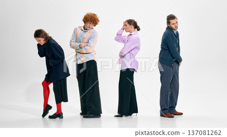Diverse business professionals standing apart in isolated formation. 137081262