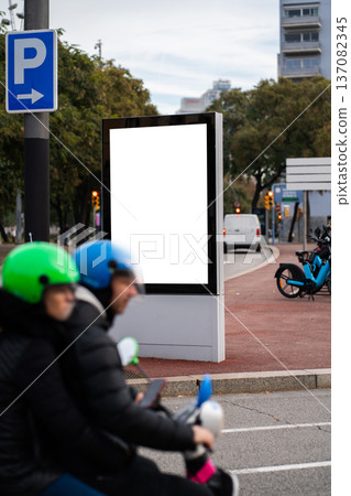 Blank white street advertising billboard on a city street 137082345
