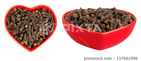 dry spice cloves in ceramic bowl isolated on white background. Top view. Flat lay dry spice cloves in ceramic bowl isolated on white background. Top view. Flat lay 137082996