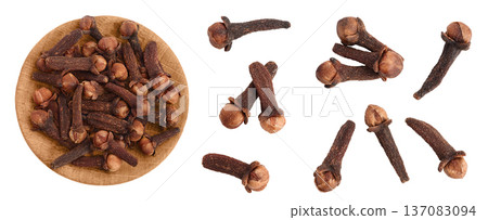 Dry spice cloves in wooden bowl isolated on white background . Top view. Flat lay 137083094
