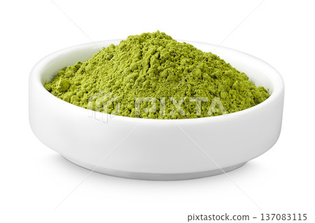 Green matcha powder in ceramic bowl isolated on white background. Top view Green matcha powder in ceramic bowl isolated on white background. Top view 137083115