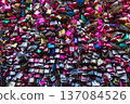 many pieces of many colorful crumpled paper 137084526