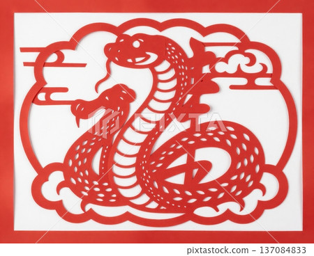 Traditional Chinese paper cutting red dragon with clouds in square frame, zodiac symbol for Lunar New Year Year of the Dragon decoration. 137084833
