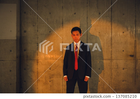 Suit man and shadow Suit man and shadow 137085210