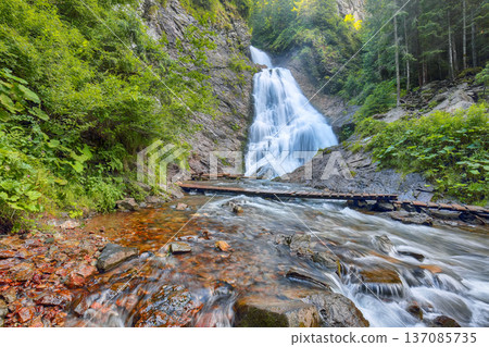 Breathtaking view of Bride's Veil / Valul Miresei Waterfall. Breathtaking view of Bride's Veil / Valul Miresei Waterfall. 137085735