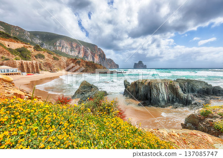 Remarkable view of beach Portu Cauli in Masua with Pan di Zucchero at background. Remarkable view of beach Portu Cauli in Masua with Pan di Zucchero at background. 137085747