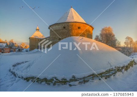 Ancient Russian fortress on Staraya Ladoga. Sun is setting 137085943