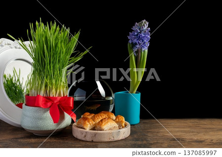 Nowruz festive table,Persian new year decoration,Tabletop with Haft-seen elements for Novruz Nowruz festive table,Persian new year decoration,Tabletop with Haft-seen elements for Novruz 137085997