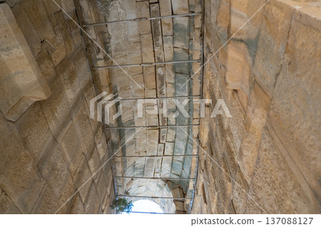 Ancient Stone Wall and Arched Passageway in Demre, Turkey, Showcasing Timeless Architectural Craftsmanship. 137088127