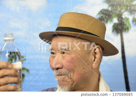 An elderly person hydrating to prevent heatstroke An elderly person hydrating to prevent heatstroke 137089085