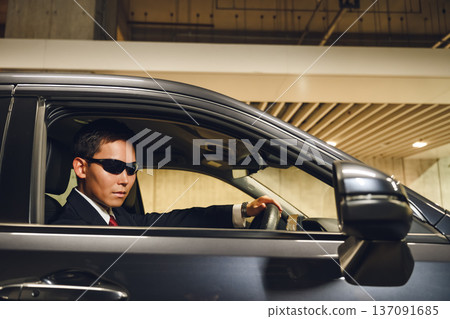 Cautious man in the driver's seat Cautious man in the driver's seat 137091685