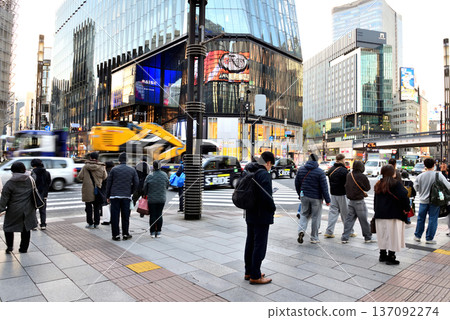 People waiting for the traffic light at Sukiyabashi Scramble Crossing People waiting for the traffic light at Sukiyabashi Scramble Crossing 137092274
