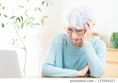 Senior woman tired of digital Senior woman tired of digital 137093027