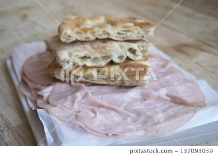Pizza bianca with mortadella bologna 137093039