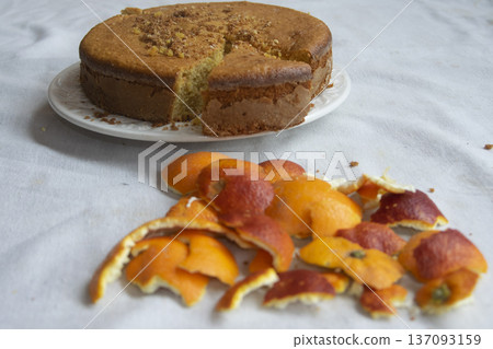 Homemade orange cake with sliced piece 137093159