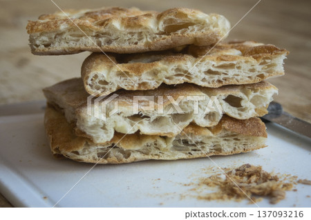 italian white pizza slices stacked 137093216