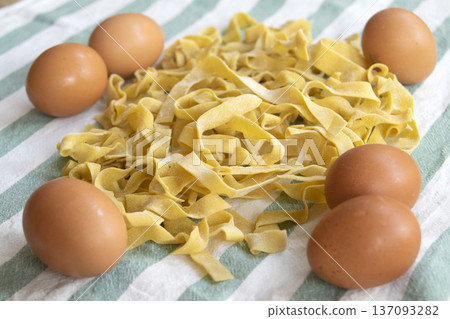 fresh egg tagliatelle pasta with whole eggs fresh egg tagliatelle pasta with whole eggs 137093282