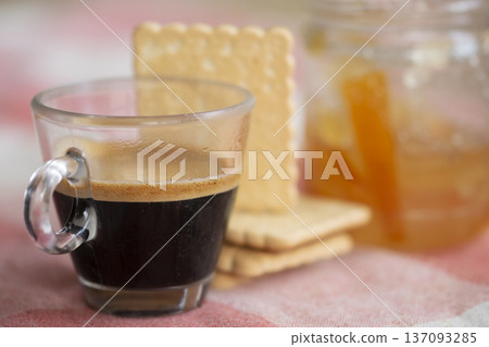 espresso coffee with orange juice and cookies breakfast composition 137093285