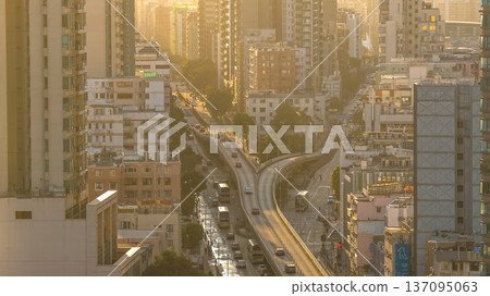 Golden Hour Light Shines Across Bustling Kowloon Road Network Feb 15 2026 137095063