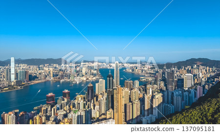 Victoria Harbour Shimmers Between Iconic Hong Kong Urban Skylines Feb 14 2026 137095181