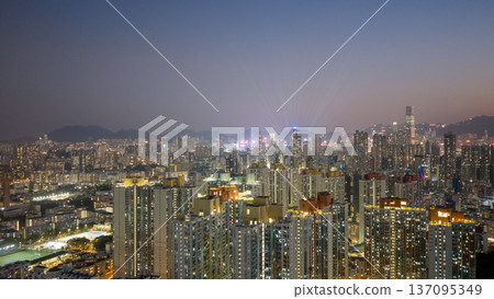 Colorful Kowloon High Rises Glow Against Deepening Evening Skyline Feb 13 2026 137095349