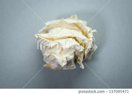 round lump paper on grey background, recycle used paper 137095471