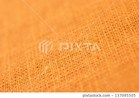 orange hemp viscose natural fabric cloth color, sackcloth rough texture of textile 137095505