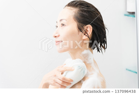 Woman washing her body beauty image Woman washing her body beauty image 137096438