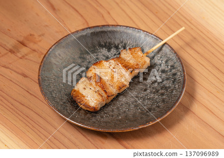 Pork skewers: A classic izakaya dish, grilled to perfection over charcoal 137096989