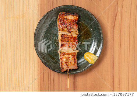 Pork skewers: A classic izakaya dish, grilled to perfection over charcoal Pork skewers: A classic izakaya dish, grilled to perfection over charcoal 137097177