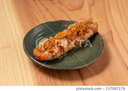 Pork skewers: A classic izakaya dish, grilled to perfection over charcoal 137097179